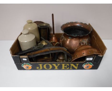 A box of Art Nouveau copper planter, copper funnel, brass ware, horse brasses, two stone ware hot water bottles etc 