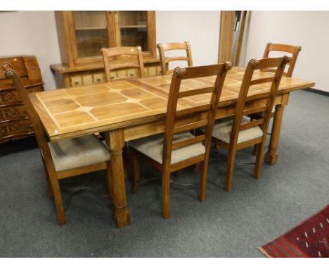 A Barker and Stonehouse Flagstone extending dining room table, together with six chair, fully extended length 233cm (7)