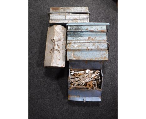 Six metal tool boxes containing assorted hand tools including spanners, wheel braces, etc