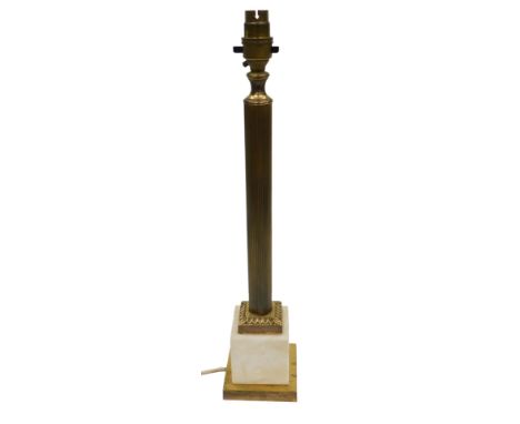 An early 20thC table lamp, brass Corinthian column on a white marble base, on a brass square base, with a cream tapering shad