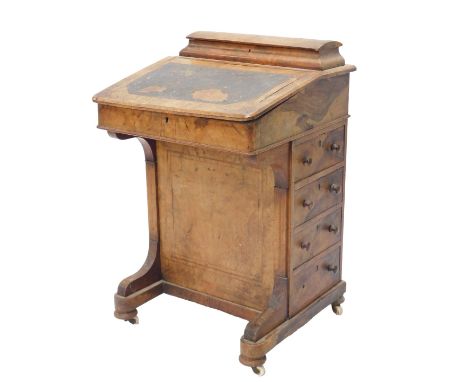A Victorian walnut and marquetry Davenport, the top with a hinged section, previously for pigeon holes, etc., the fall with a