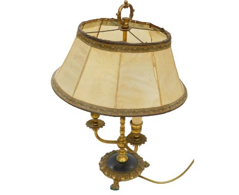An early 20thC brass table lamp, of three branch candelabrum form, with a hide shade, 51cm high.WARNING! This lot contains un
