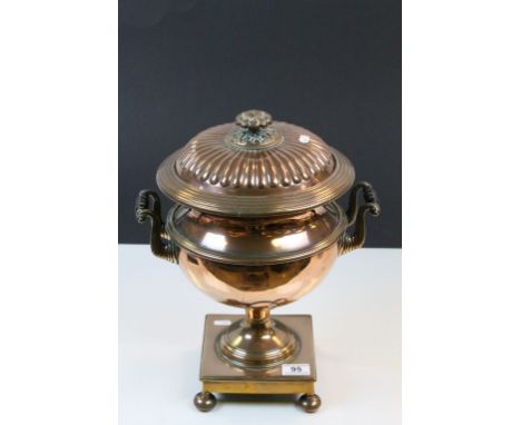 Vintage Copper lidded Urn on ball feet, marked inside lid "Warranted West London Manufactory" 