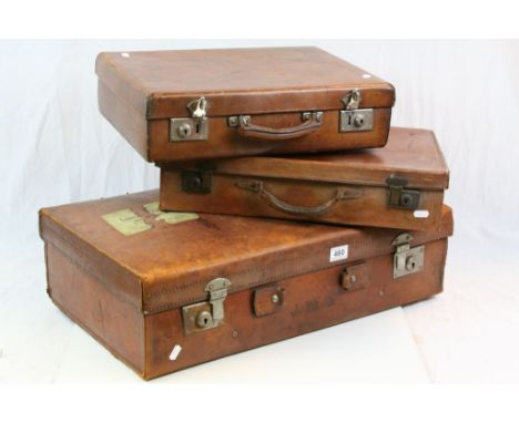 Three vintage leather Suitcases in various sizes