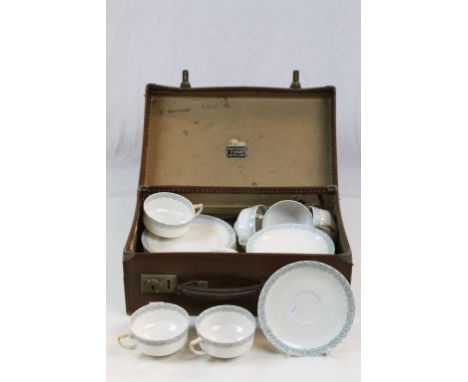 Small suitcase of "Haviland France" ceramic cups and saucers etc with "Nordiska Kompaniet Stockholm" import marks