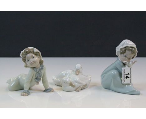 Two Lladro Figurines and another Nao model of a pair of Ducks