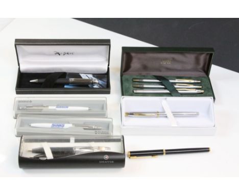 Collection of vintage pens to include a set of three Cross pens, another Cross pen, two Sheaffer pens etc 