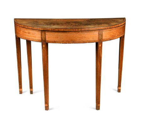 A George III satinwood and marquetry demi-lune card table, the crossbanded fold over top enclosing a green baize playing surf