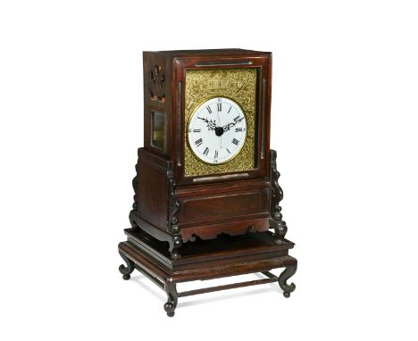 A Chinese twin fusee mantel clock, circa 1900, the white dial with Roman numerals and Arabic quarters, centre seconds, within