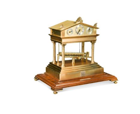 A Thwaites and Reed rolling ball clock, circa 1972, No.24/100, in the manner of William Congreve,  the architectural lacquere