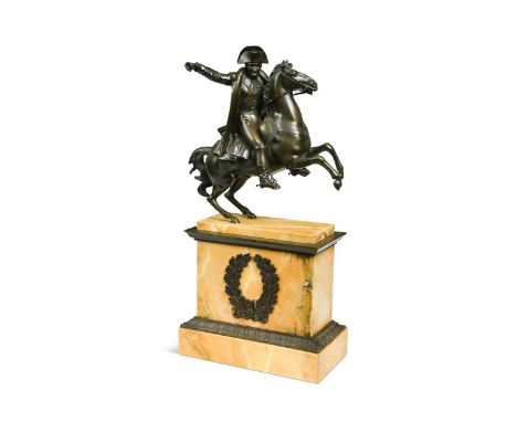 A patinated bronze model of Napoleon on horseback, late 19th century,  he sits atop his rearing steed, Marango, mounted to a 