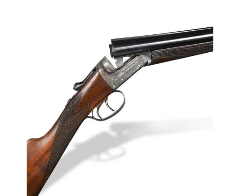 Webley & Scott, a model 700 12 bore boxlock ejector gun, No. 130619, with 26" barrels, the frame with scroll engraving and re