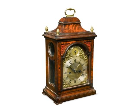 A George III mahogany bracket clock, the inverted bell top case with four brass pineapple finials and carrying handle, above 