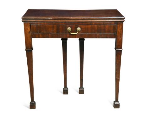 A George III mahogany card table, the folding rectangular top enclosing a green baize lined playing surface with counter well