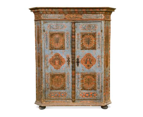 A Tyrolean painted pine 'Bauernschrank' wardrobe, 18th century, the pair of cupboard doors painted with various flowers and r