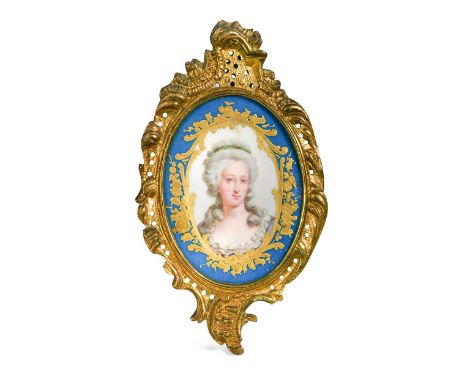 Continental School (19th century) A miniature painted porcelain plaque depicting a portrait of a lady, possibly Marie Antoine