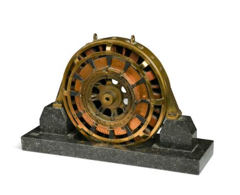 An Art Deco bronze desk model of a turbine, mounted to a granite plinth base27 x 40 x 12cm