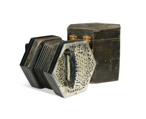 Jeffries Bros., a fifty-eight key Duet concertina, late 19th or early 20th century, the hexagonal body with foliate pierced m