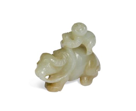 A Chinese mutton fat jade small carving of a boy and water buffalo, late Qing Dynasty, the semi-recumbent beast tethered back