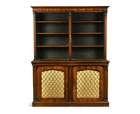 A Regency rosewood bookcase cabinet, with open shelf top above a pair of arched grille doors, on a plinth base192 x 149 x 49c