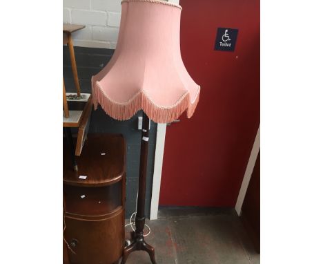 AN EDWARDIAN TRIPOD STANDARD LAMP