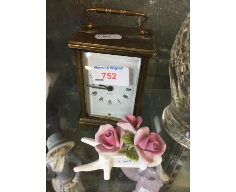 BRASS CARRIAGE CLOCK AND A POSY
