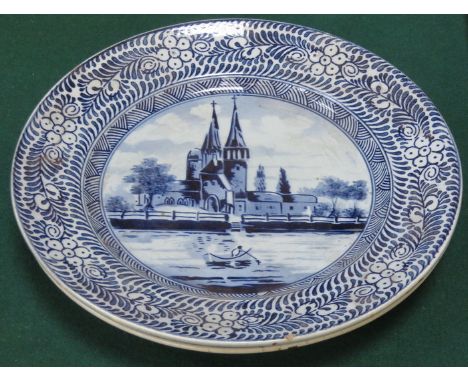 TWO DELFT STYLE CONTINENTAL BLUE AND WHITE CERAMIC PLATES (AT FAULT) 