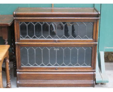 GLOBE WERNICKE TWO SECTION OAK STACKING BOOKCASE WITH LEADED GLASS DOORS 