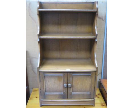 ERCOL OPEN BOOKSHELVES WITH CUPBOARD DOORS BELOW 