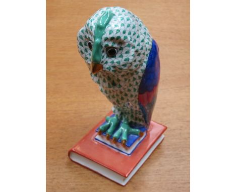 LARGE HEREND HANDPAINTED AND GILDED CERAMIC OWL, PERCHED ON TWO GRADUATED BOOKS APPROXIMATELY 22cm HIGH                      