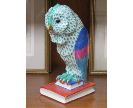 LARGE HEREND HANDPAINTED AND GILDED CERAMIC OWL, PERCHED ON TWO GRADUATED BOOKS, APPROXIMATELY 22cm HIGH 