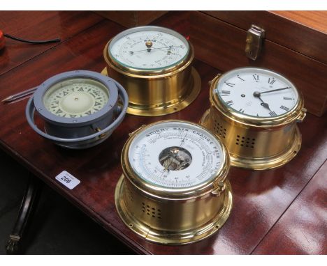 TWO BRASS CASED SHIP'S BAROMETERS AND SIMILAR SHIP'S CLOCK AND ALSO SHIP'S COMPASS 
