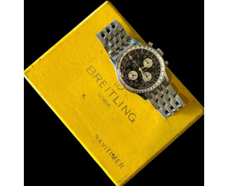 A 1969 Breitling Chronograph Cosmonaute Navitimer Watch, model no. 809. Stainless steel brick link bracelet. Original yellow 