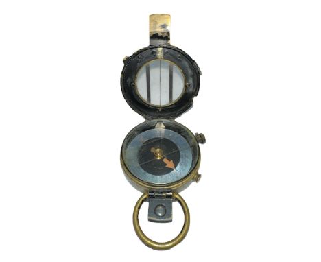 A First World War (WWI) British brass marching compass 1918, painted black exterior. Reverse reads F-L No 148400 1918. 