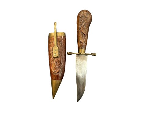 Indian carved wood single-edge blade knife, with wooden carved scabbard, push to release clasp. Blade measures 10cm, overall 