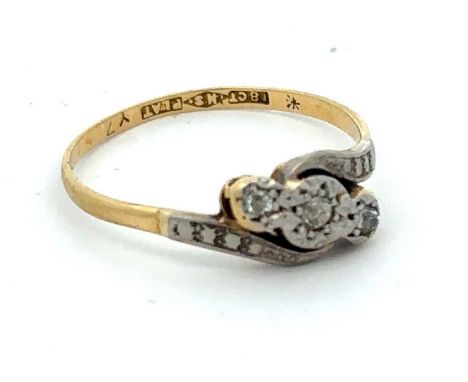 An 18ct gold three stone diamond ring. Diamonds are old cut, size R. Weight 2.25g approxPlease see sale description/informati