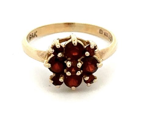 A 9ct gold ring set with garnets, weight 2.7g. Size K/LPlease see sale description/information for conditions on buying jewel