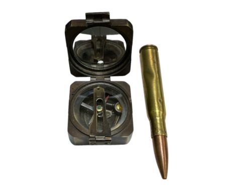 Kelvin &amp; Hughes 1917 brass compass, approx. 5.5 x 5.5 x 3cm when closed, along with bullet case (13.5cm). 