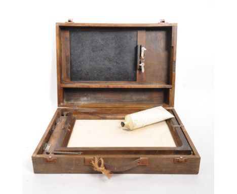 A vintage 20th century ink press kit machine. In an oak body with hinged spring loaded board, metal fixings and leather carry