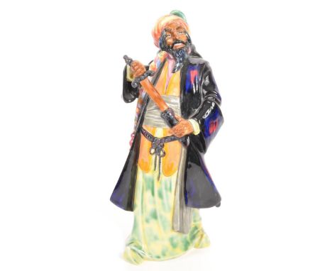Royal Doulton - A porcelain china Royal Doulton figurine ' Blue Beard ' HN2105. Portrayed with coat open and sword being pull
