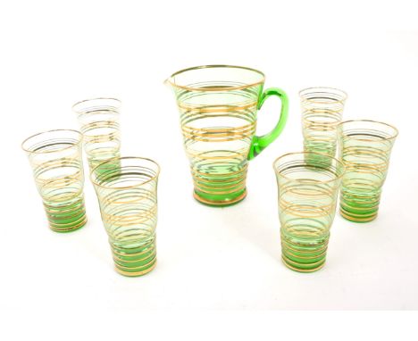 A mid 20th Century retro glass green lemonade set with gold gilt circular ring detailing to body. Comprising of six glasses a