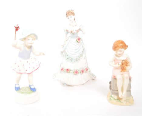Royal Worcester - A collection of three porcelain china Royal Worcester figurines comprising of A Royal Anniversary (CW317) i
