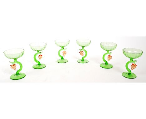 A collection of six small 20th Century vintage green sherry glasses having fruit decoration to central support with hanging g