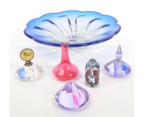 A mixed collection of glass items comprising of a large centerpiece bowl in the form of a flower in blue colourway. Together 