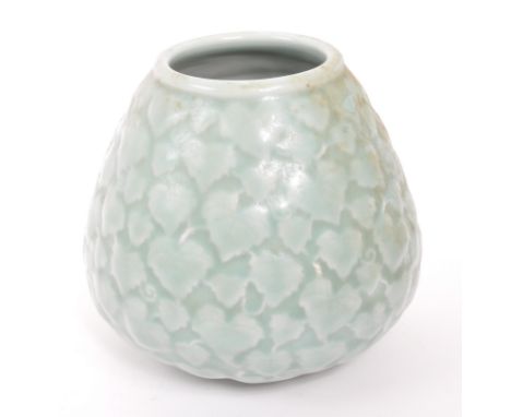 A 19th Century Chinese ceramic squat vase with tapering top in light green having foliate ivy leaf design to body. Measuring 