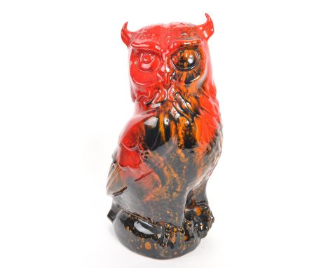 Royal Doulton - A large 20th Century vintage Royal Doulton Flambe glaze veined figurine in the form of an owl perched on a ro