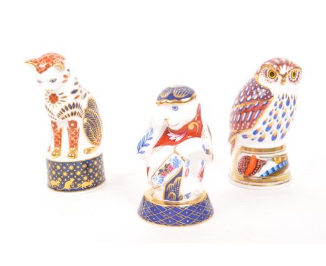 Royal Worcester - A collection of three porcelain china Royal Worcester candle snuffers from the Connoisseur Collection. To i