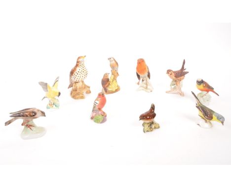 Beswick / Goebel / Royal Worcester - A collection of ten porcelain china figures in the form of birds, of various breeds - go