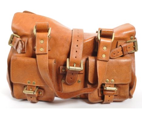 Mulberry - A vintage Mulberry leather handbag. The handbag in a tan colourway with twin pockets to the front and large pocket