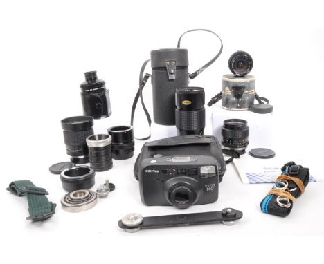 A collection of 20th century manual focus 35mm O/OM mount camera lenses. The collection to include an Olympus H.Zuiko 24mm F2